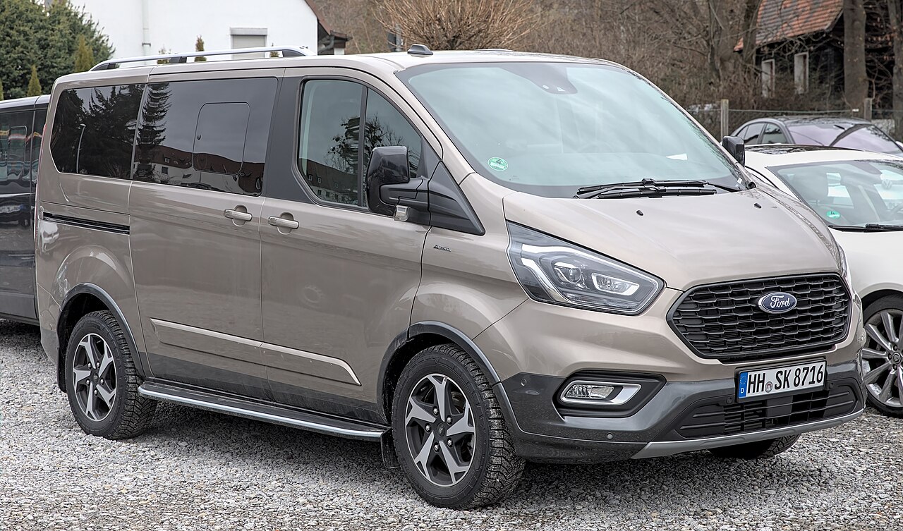 Beige Ford Tourneo Custom, front three-quarter view